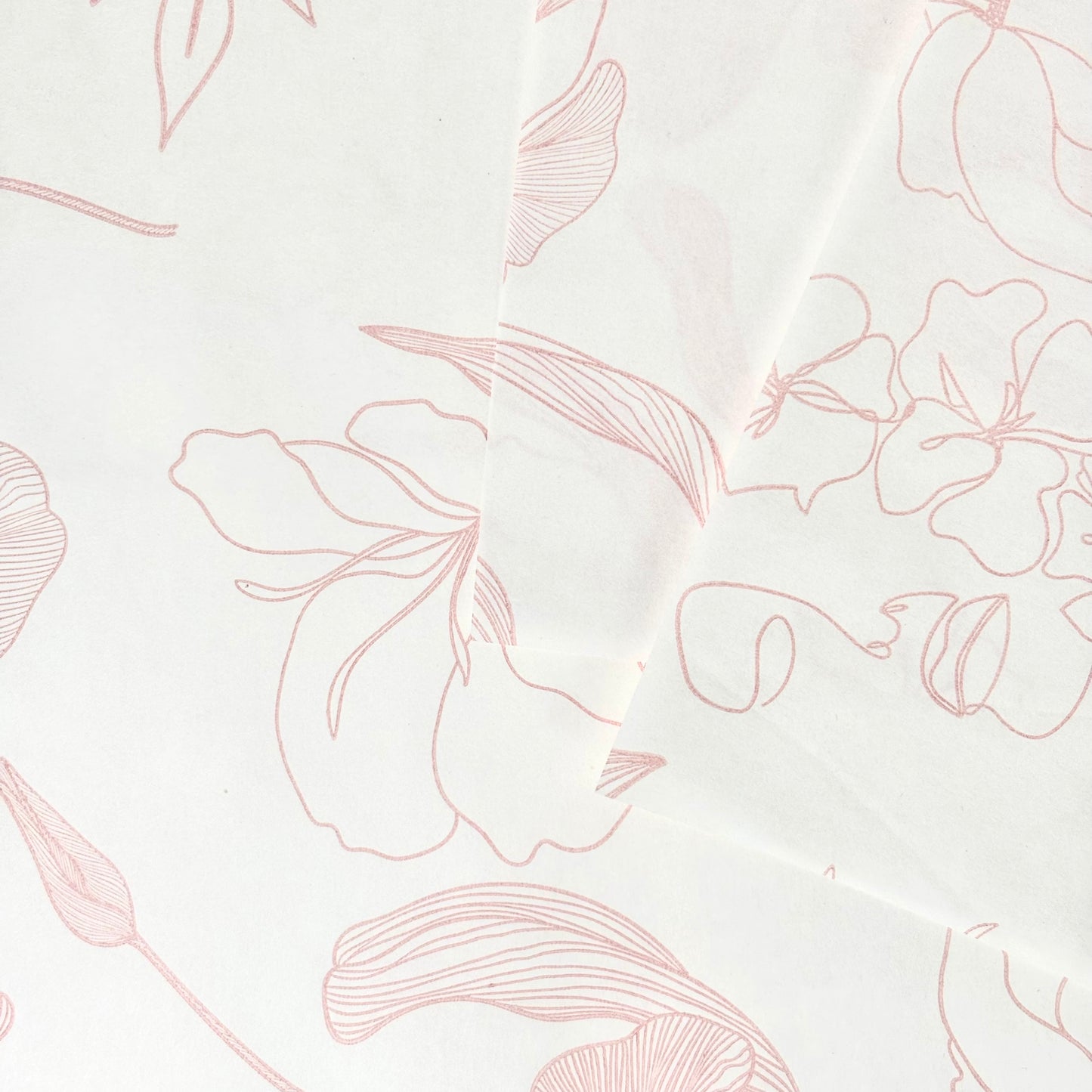 Draps imprimés blancs et roses