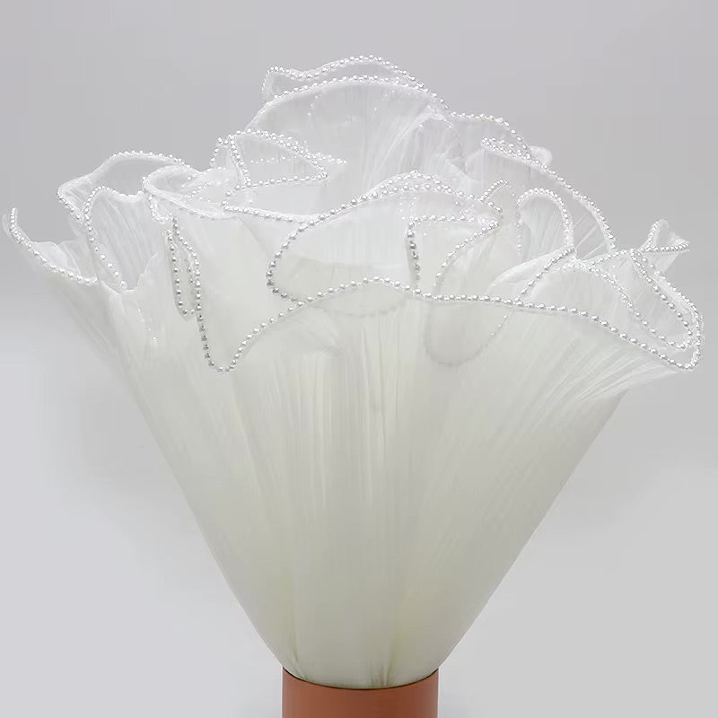 Maille à volants ondulée avec bord nacré