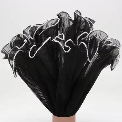 Maille à volants ondulée avec bord nacré